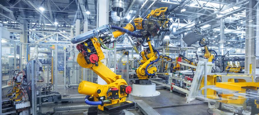 What Are the Long-Term Implications of AI Robots and Industrial Robots on the Manufacturing Industry?