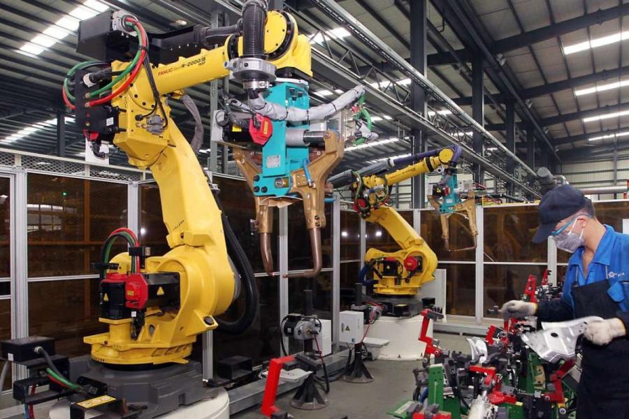 What Are the Long-Term Implications of AI Robots in Industrial Settings?